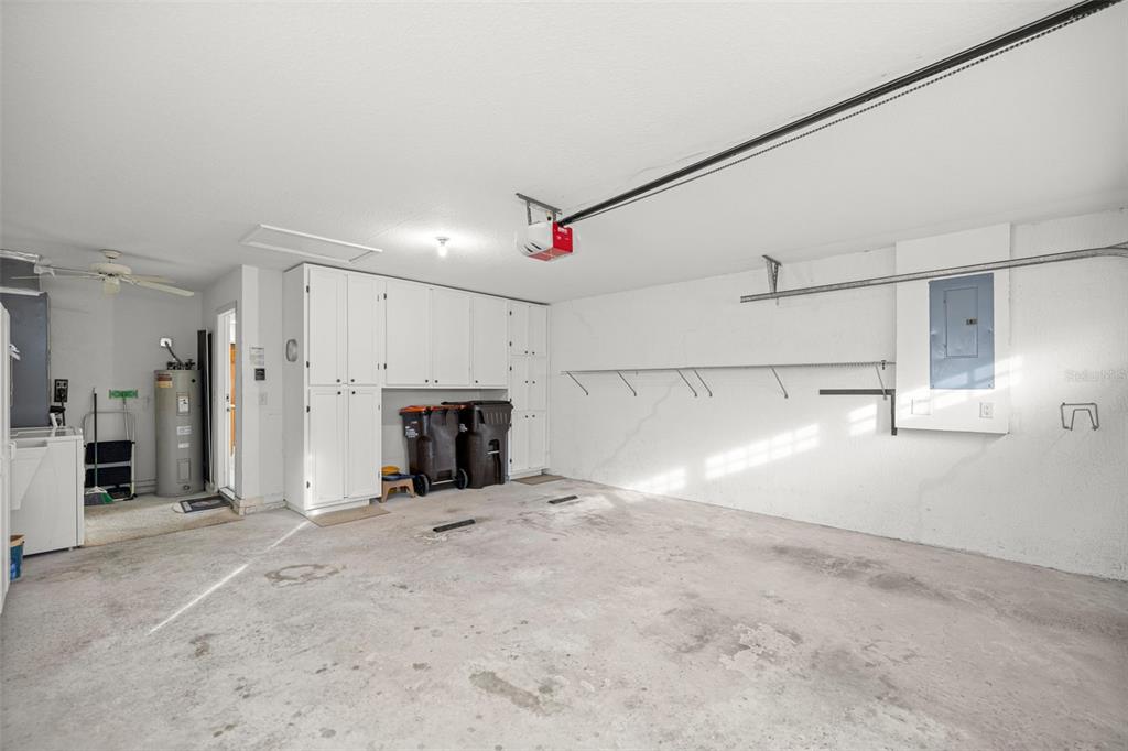 10970 Southwest 69th Circle Ocala, FL 34476 - Photo 26 of 50 a view of a empty room with fireplace and windows