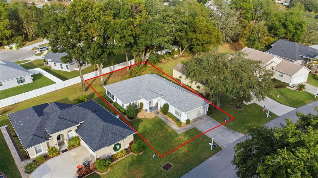 10970 Southwest 69th Circle Ocala, FL 34476 - Photo 34 of 50 an aerial view of a house with a yard basket ball court