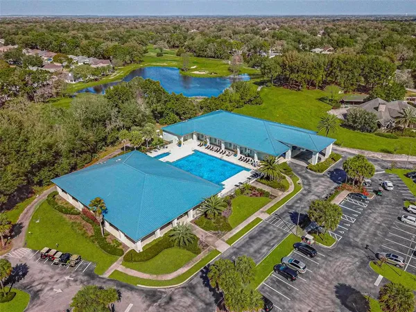 an aerial view of a house with a ocean view