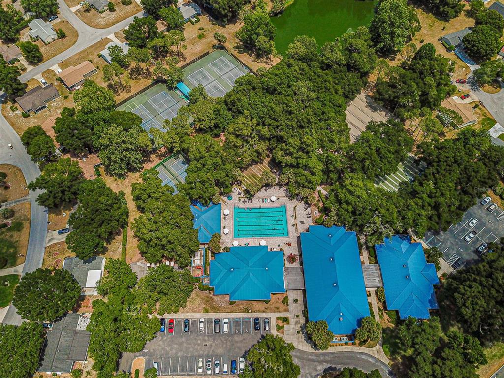 10970 Southwest 69th Circle Ocala, FL 34476 - Photo 48 of 50 an aerial view of a house with yard swimming pool and outdoor seating