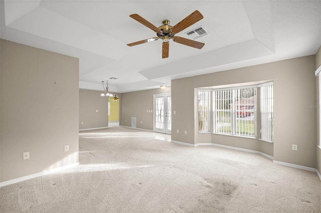 10970 Southwest 69th Circle Ocala, FL 34476 - Photo 8 of 50 a view of an empty room with a window