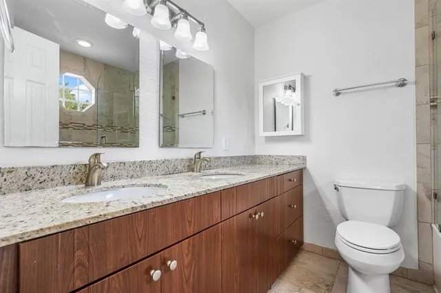 a bathroom with a bathtub and shower
