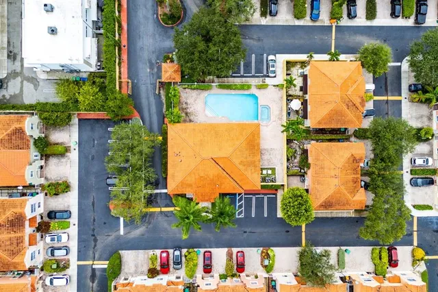 an aerial view of a house with a garden