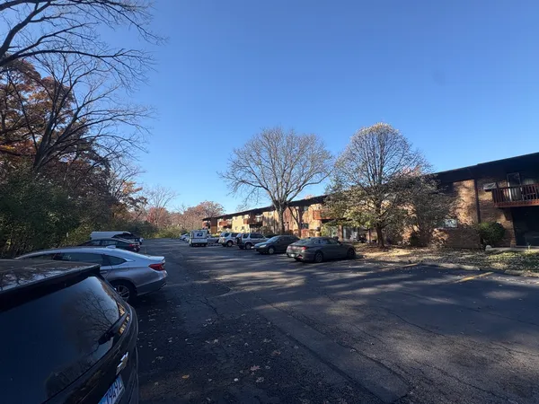 a view of street with parked cars