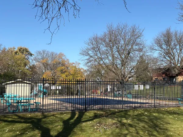 a view of a yard with a lake view