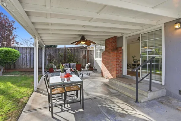 a outdoor space with lots of furniture and garden