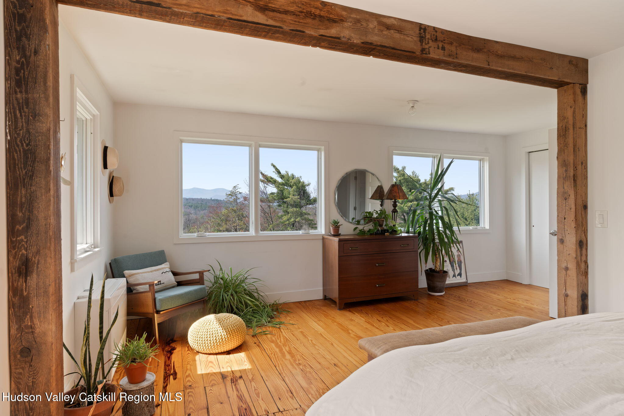 4701 Atwood Road Stone Ridge, NY 12484 - Photo 18 of 41 a bedroom with a bed and a large window