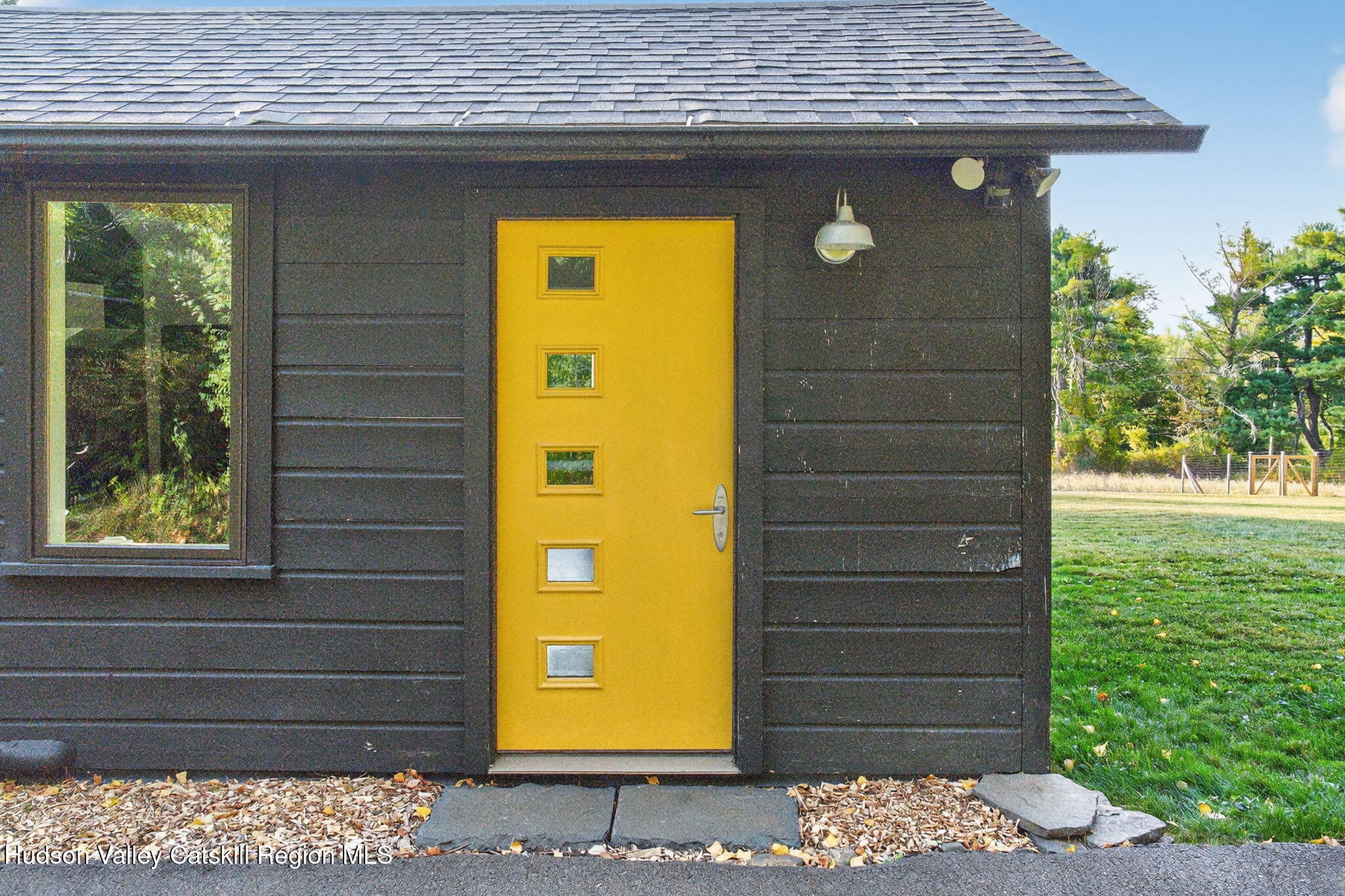 4701 Atwood Road Stone Ridge, NY 12484 - Photo 25 of 41 a front view of a house with a yard