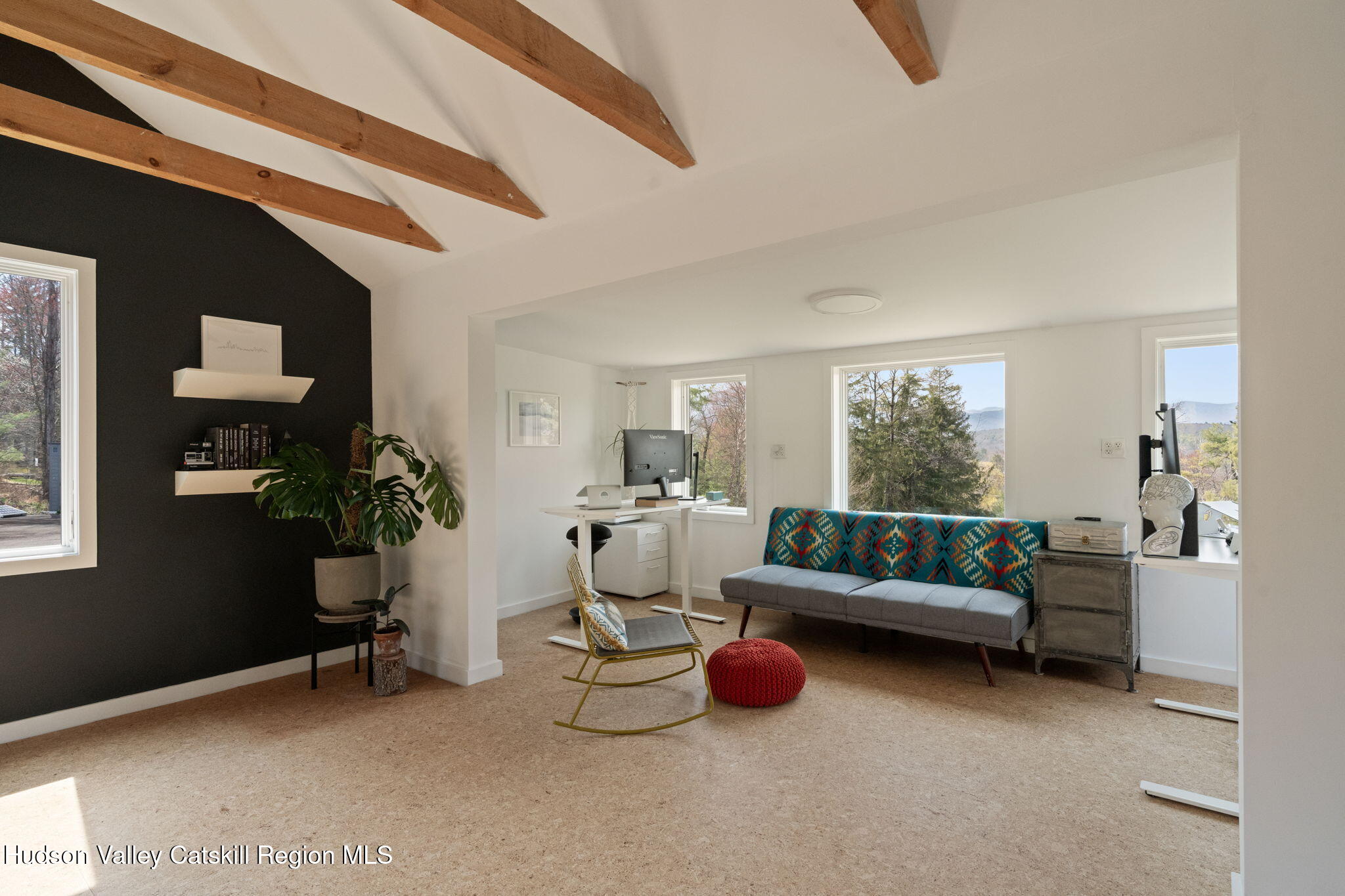 4701 Atwood Road Stone Ridge, NY 12484 - Photo 27 of 41 a living room with furniture and a potted plant