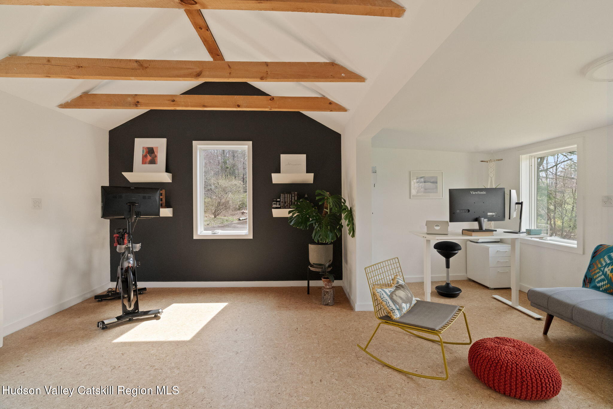 4701 Atwood Road Stone Ridge, NY 12484 - Photo 28 of 41 a living room with furniture a window and gym equipment
