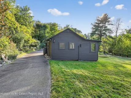 a view of a back yard of the house