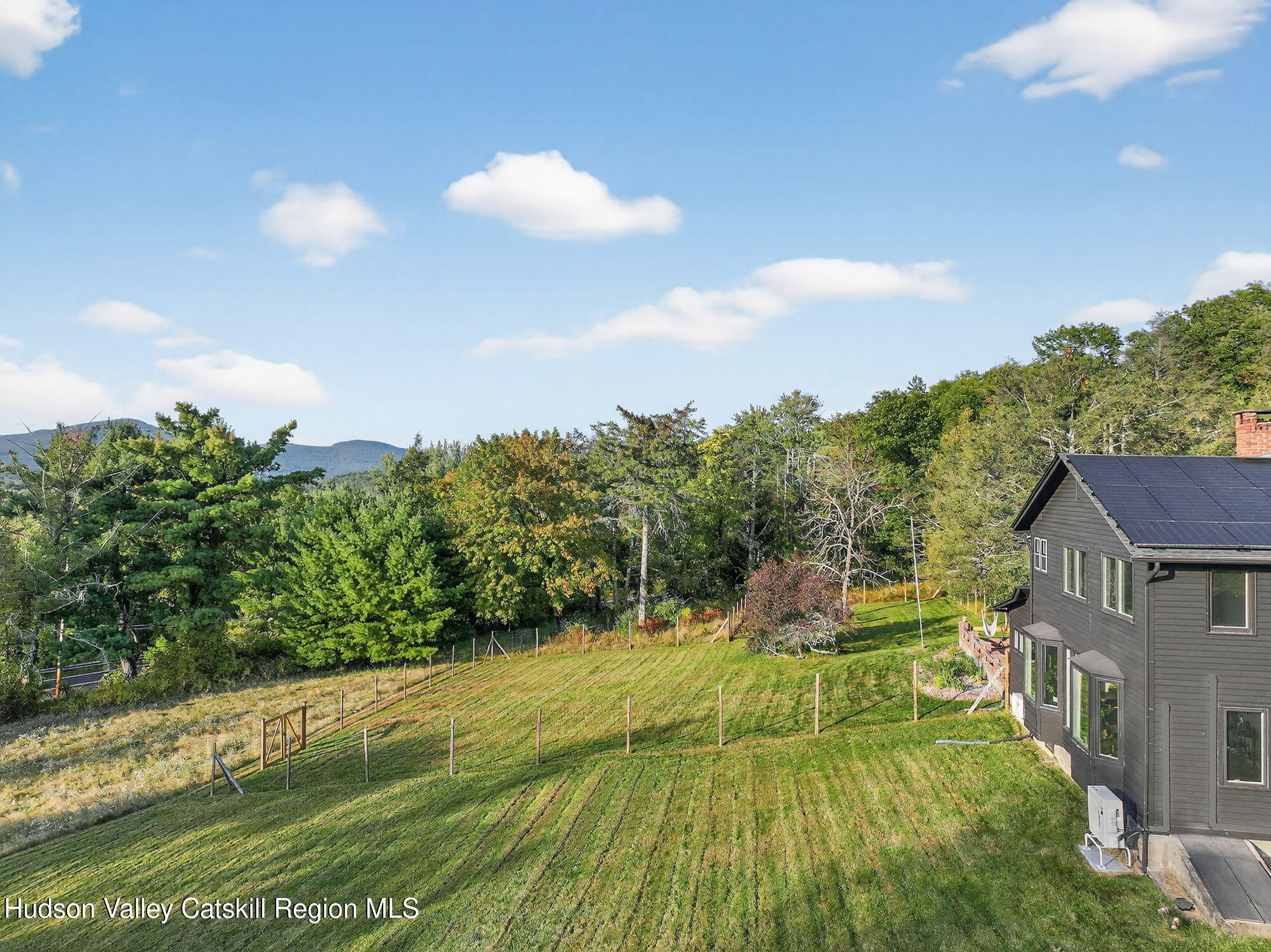 4701 Atwood Road Stone Ridge, NY 12484 - Photo 40 of 41 a view of an house with backyard outdoor space and garden
