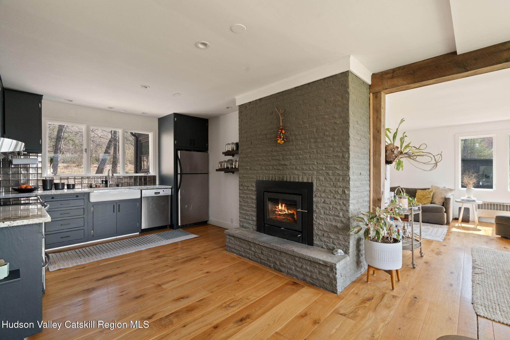 4701 Atwood Road Stone Ridge, NY 12484 - Photo 7 of 41 a living room with furniture and a fireplace