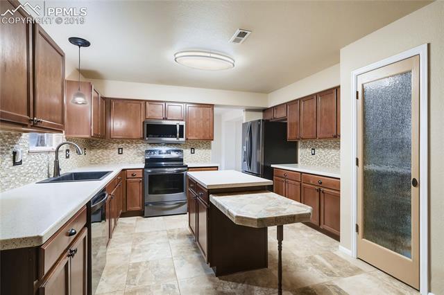 7825 Morning Dew Road Colorado Springs, CO 80908 - Photo 9 of 19