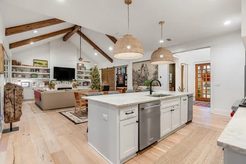a outdoor space with patio the couches and a dining table with garden view
