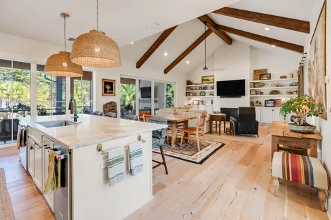 a kitchen with a sink and cabinets