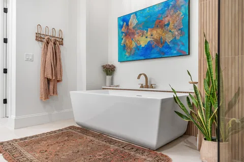 a kitchen with stainless steel appliances a stove and a refrigerator