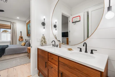 a view of a house with swimming pool and sitting area