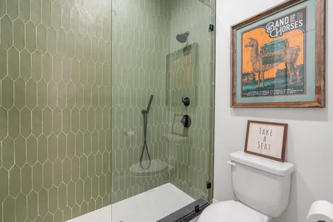 a view of swimming pool with a lounge chairs