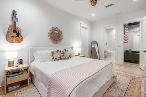 an aerial view of a house with swimming pool backyard and patio