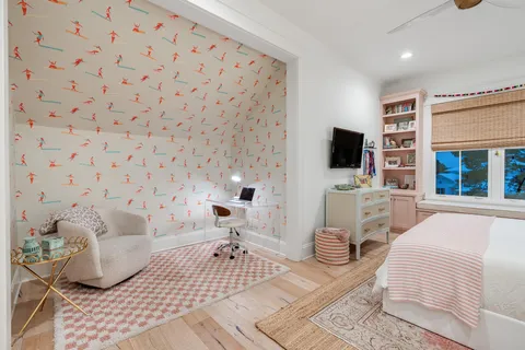 aerial view of a house with swimming pool and mountains
