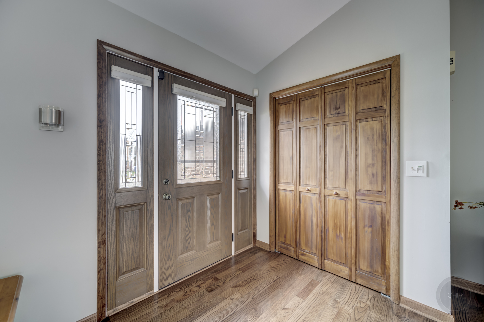 2820 Sun Valley Road Lisle, IL 60532 - Photo 2 of 46 an empty room with wooden floor closet and windows