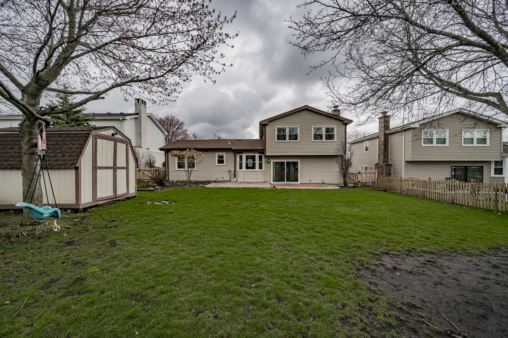 2820 Sun Valley Road Lisle, IL 60532 - Photo 40 of 46 a front view of a house with a garden