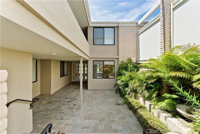 a view of a backyard with plants