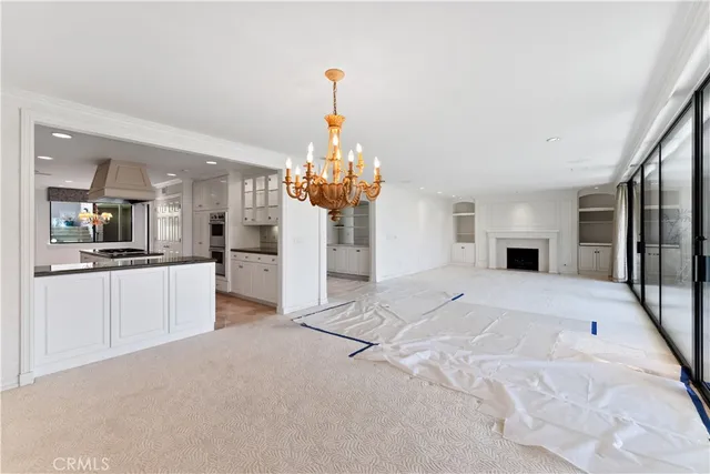 a view of an empty room with a balcony
