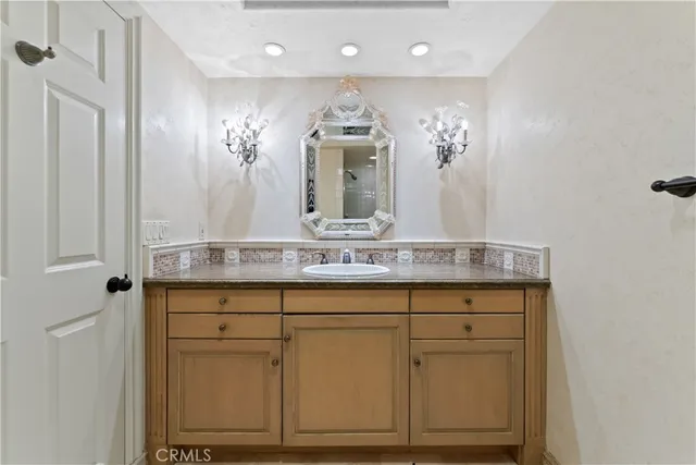 a bathroom with a toilet and shower