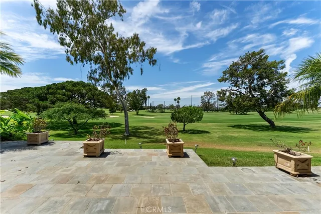 a view of a street with a building in the background