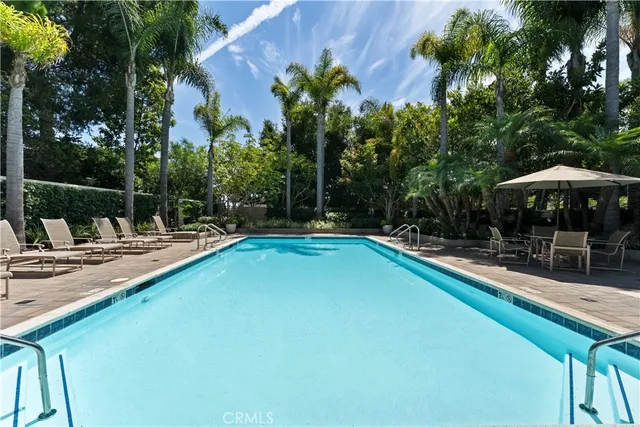 a view of a swimming pool with a patio