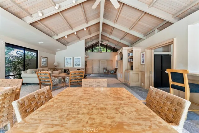 a kitchen with stainless steel appliances granite countertop a sink and a stove