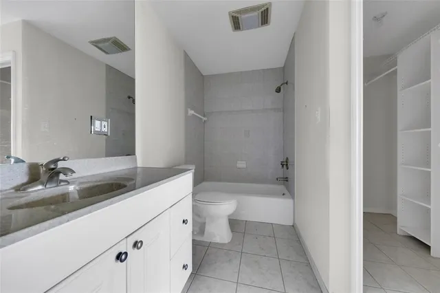 a couple of bicycles parked in front of house