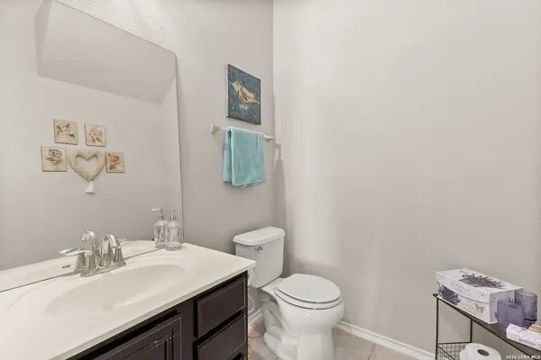a room with bookshelf and a window