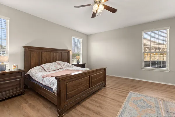 a white bath tub sitting next to a window