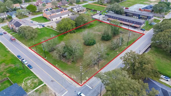 a view of a garden from a balcony