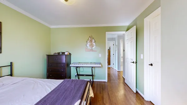 a bathroom with a sink a toilet a tub and shower