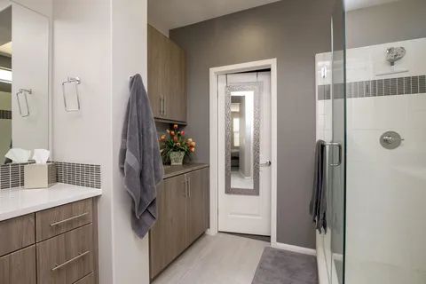 a bathroom with a tub and shower