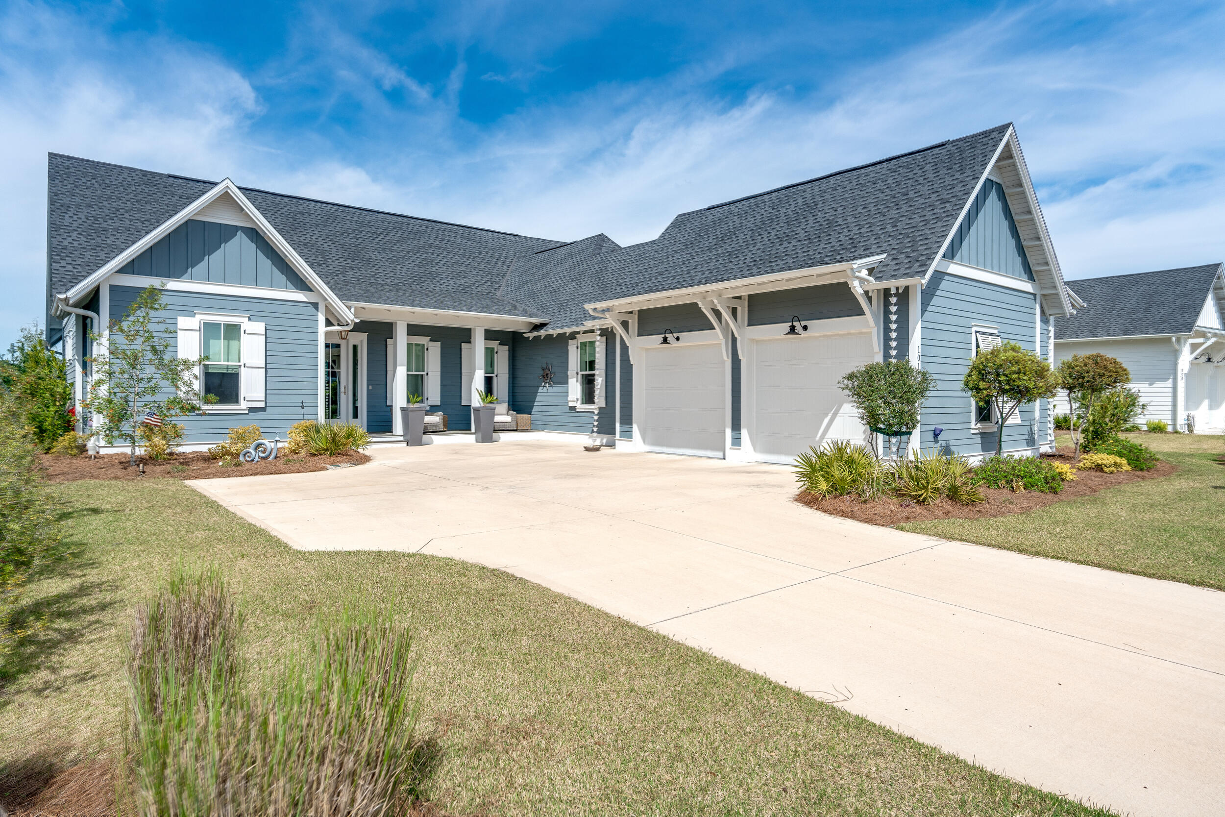 101 Sidecamp Rd Inlet Beach Inlet Beach, FL 32461 - Photo 1 of 70 a front view of a house with a yard