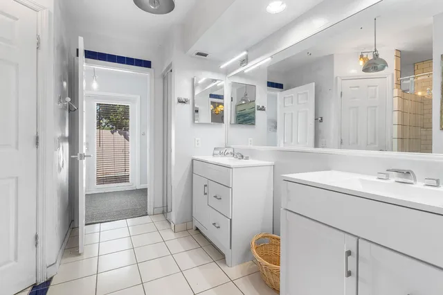 a view of a tree in front of a house