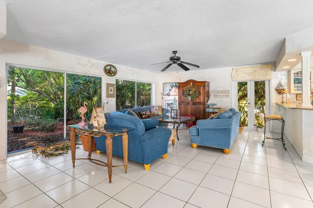 a bathroom with a sink a vanity a mirror and a shower