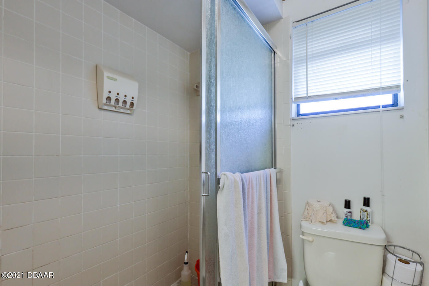 2629 Mango Tree Drive Edgewater, FL 32141 - Photo 15 of 30 a bathroom with a sink and a toilet