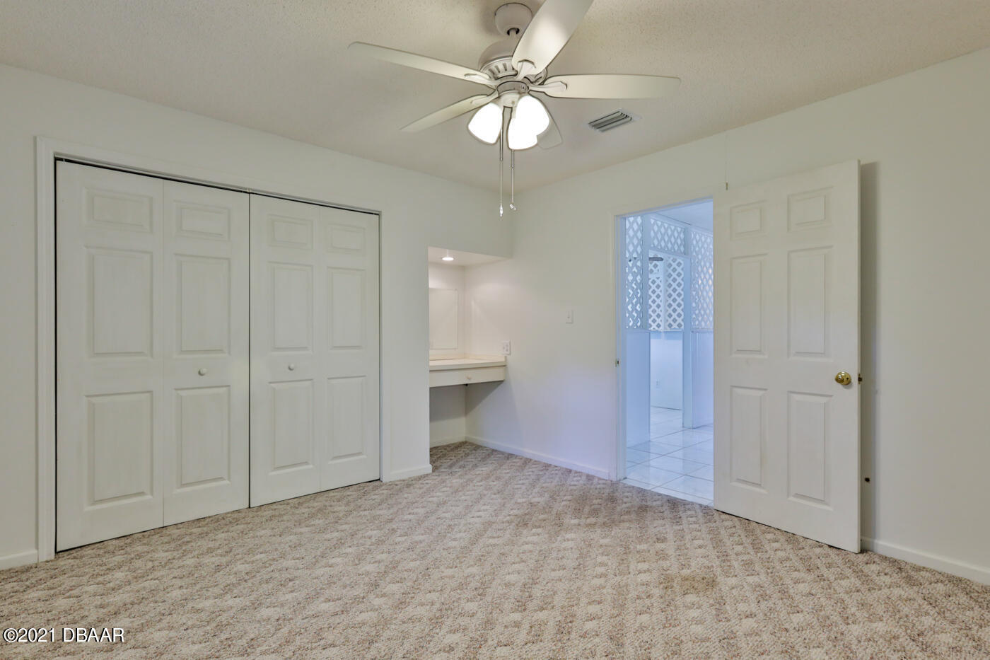 2629 Mango Tree Drive Edgewater, FL 32141 - Photo 16 of 30 wooden floor in an empty room with a ceiling fan