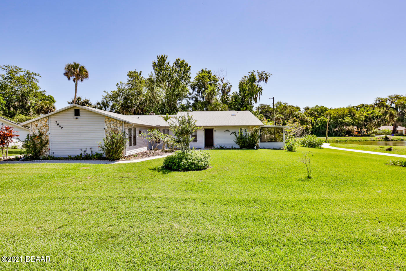 2629 Mango Tree Drive Edgewater, FL 32141 - Photo 2 of 30 a house view with a garden space