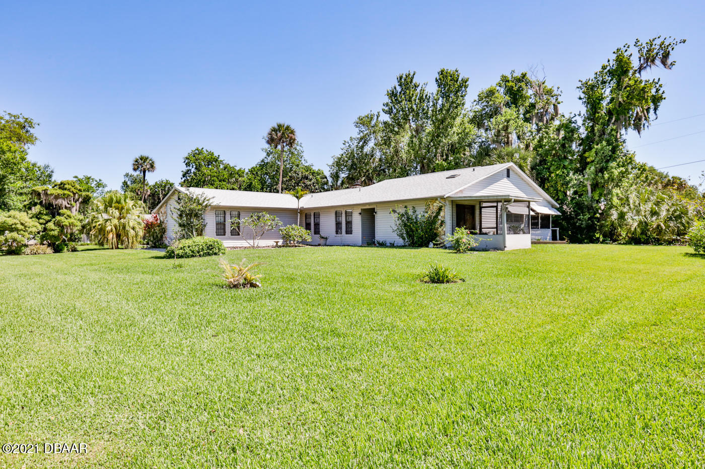 2629 Mango Tree Drive Edgewater, FL 32141 - Photo 27 of 30 a house view with a garden space