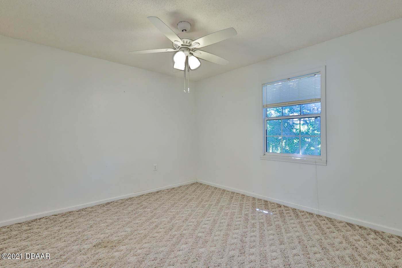 2629 Mango Tree Drive Edgewater, FL 32141 - Photo 29 of 30 wooden floor in an empty room with a window