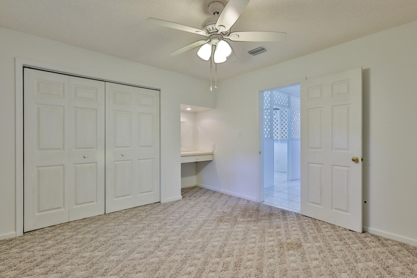 2629 Mango Tree Drive Edgewater, FL 32141 - Photo 30 of 30 wooden floor in an empty room with a ceiling fan