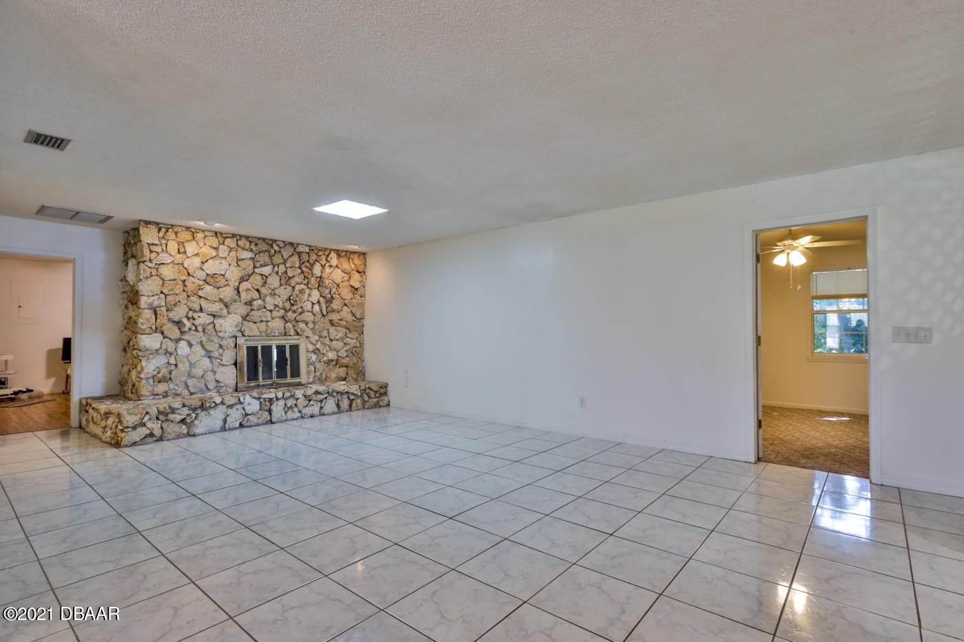 2629 Mango Tree Drive Edgewater, FL 32141 - Photo 5 of 30 a view of an empty room and a window