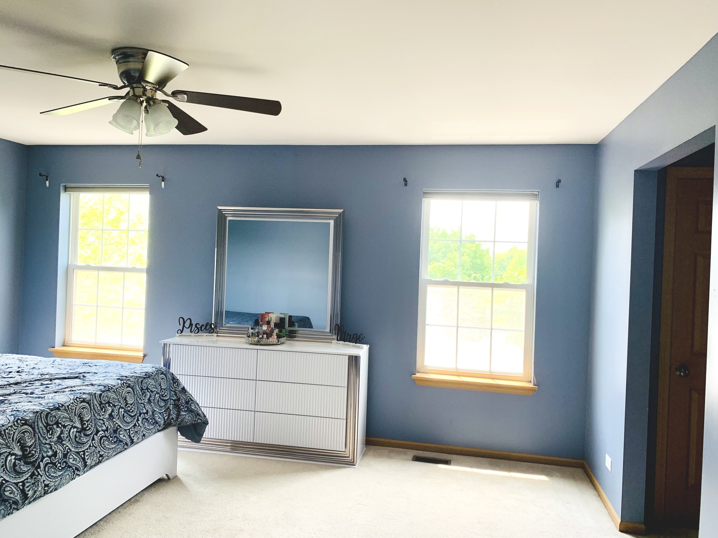 146 Goldenhill Street Carol Stream, IL 60188 - Photo 14 of 18 a bedroom with a bed and a chandelier